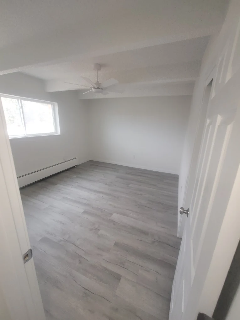 Fully renovated bathroom with marble tile, vanity and new fixtures
